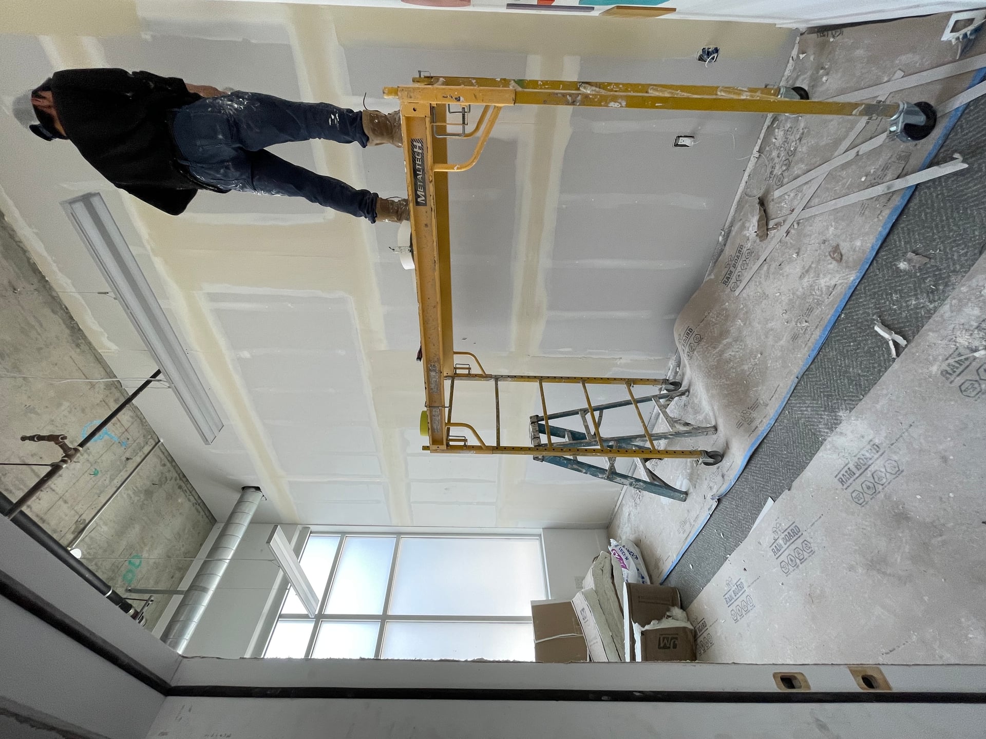 From architectural plan and engineering going through the permitting process to demo framing electrical insulation basically special insulation for the Music school, then Drywall fresh quote of Paint installing new doors and final touches