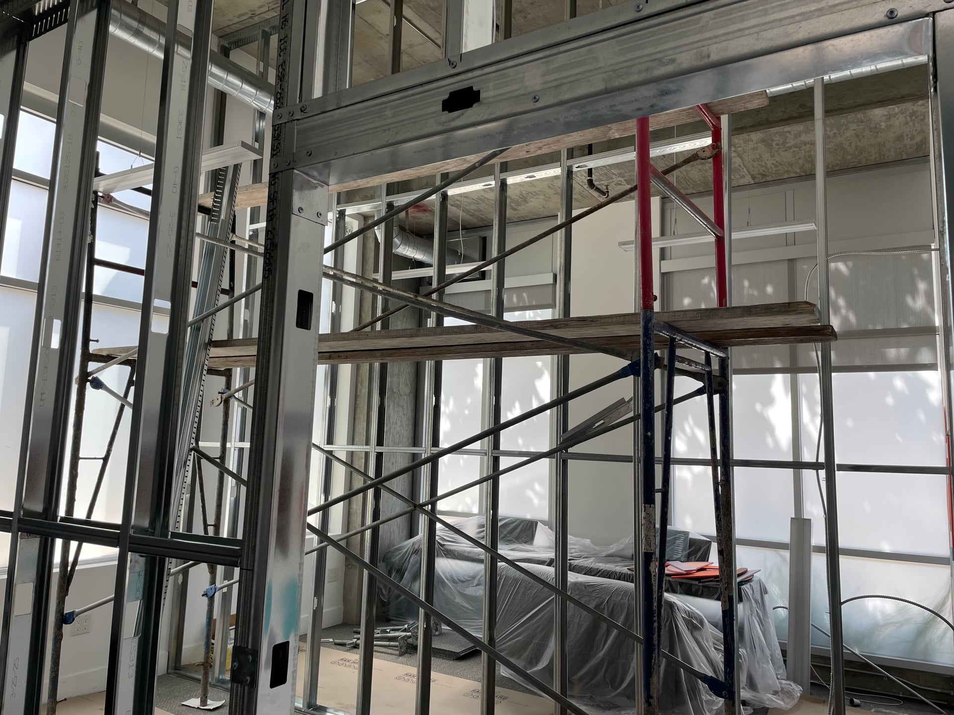 From architectural plan and engineering going through the permitting process to demo framing electrical insulation basically special insulation for the Music school, then Drywall fresh quote of Paint installing new doors and final touches