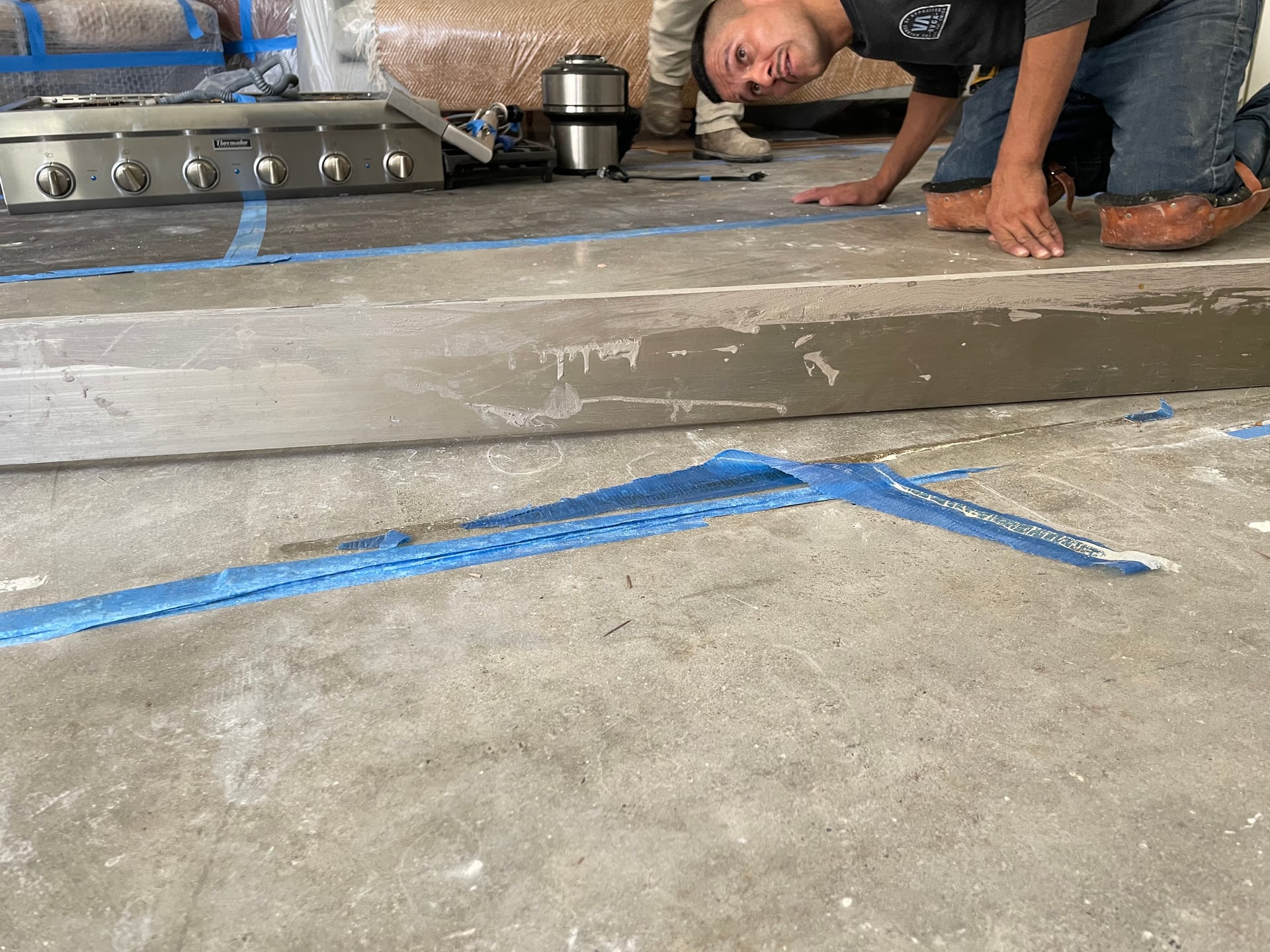 Demo existing kitchen and flooring and staircase, preparing for paying the entire townhome. Client is amazing amazed by the timeline saying she never worked with a contractor so efficient and fast looking forward to the next stage.