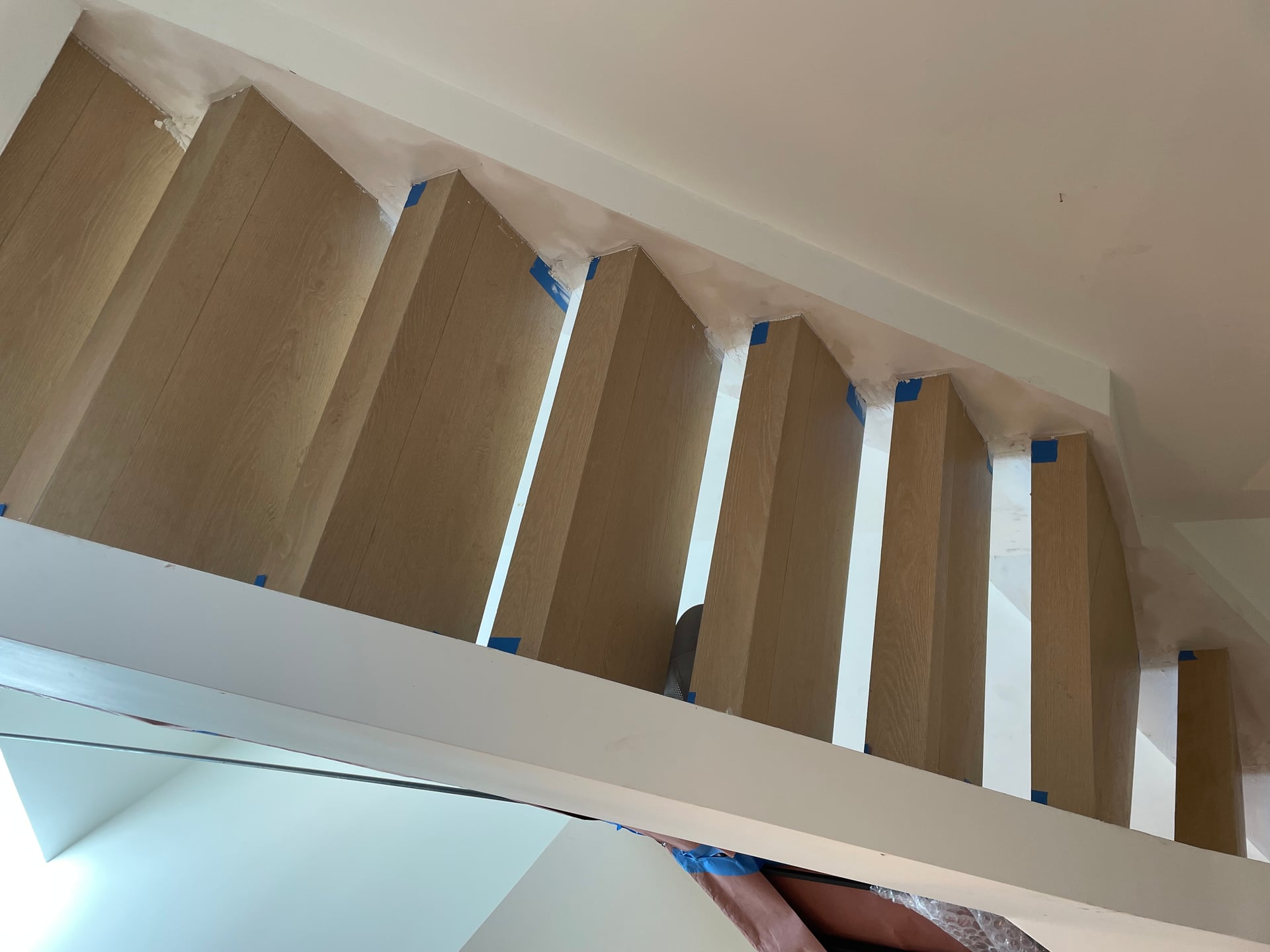 New kitchen Custom Kitchen installed client is super happy in the process of installing the flooring and the new staircase, preparing for entire townhome, faint and patio remodeling