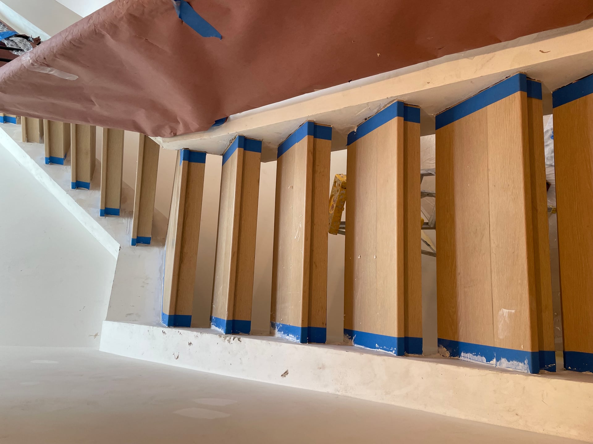 New kitchen Custom Kitchen installed client is super happy in the process of installing the flooring and the new staircase, preparing for entire townhome, faint and patio remodeling