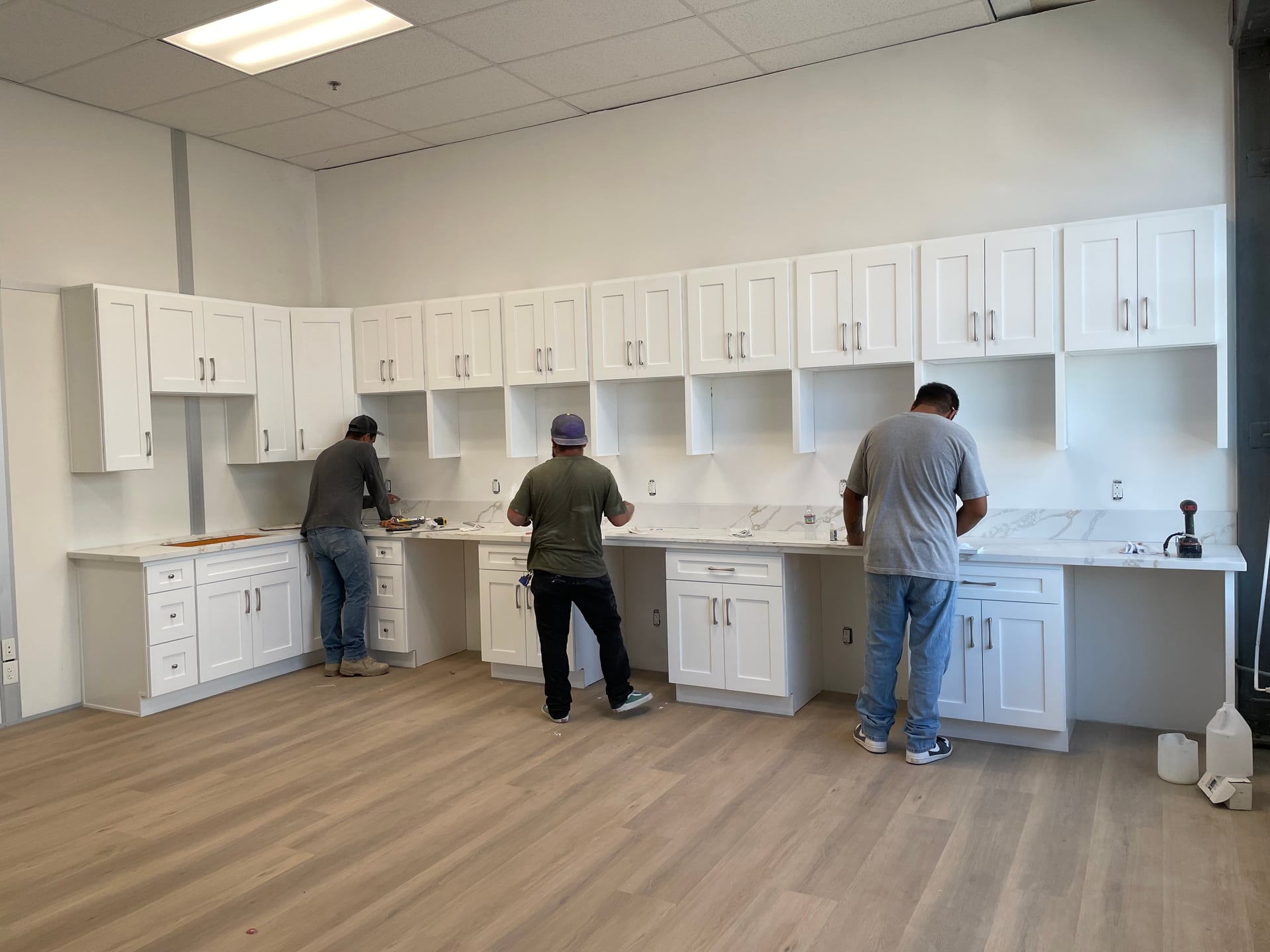 From beginning to end commercial space in Hawthorne factory, they doing such for colleges had to build a new common area for his workers with new kitchen, a new 3000 ft.² of Office. We did almost 4000 ft.² of flooring, paint the entire offices, renovate, bathrooms, and more. The client is super happy because of her workers have a new nice space to have lunch and hang out we also upgraded the entire communication system with the machines on the floor, which was super sophisticated low-voltage project