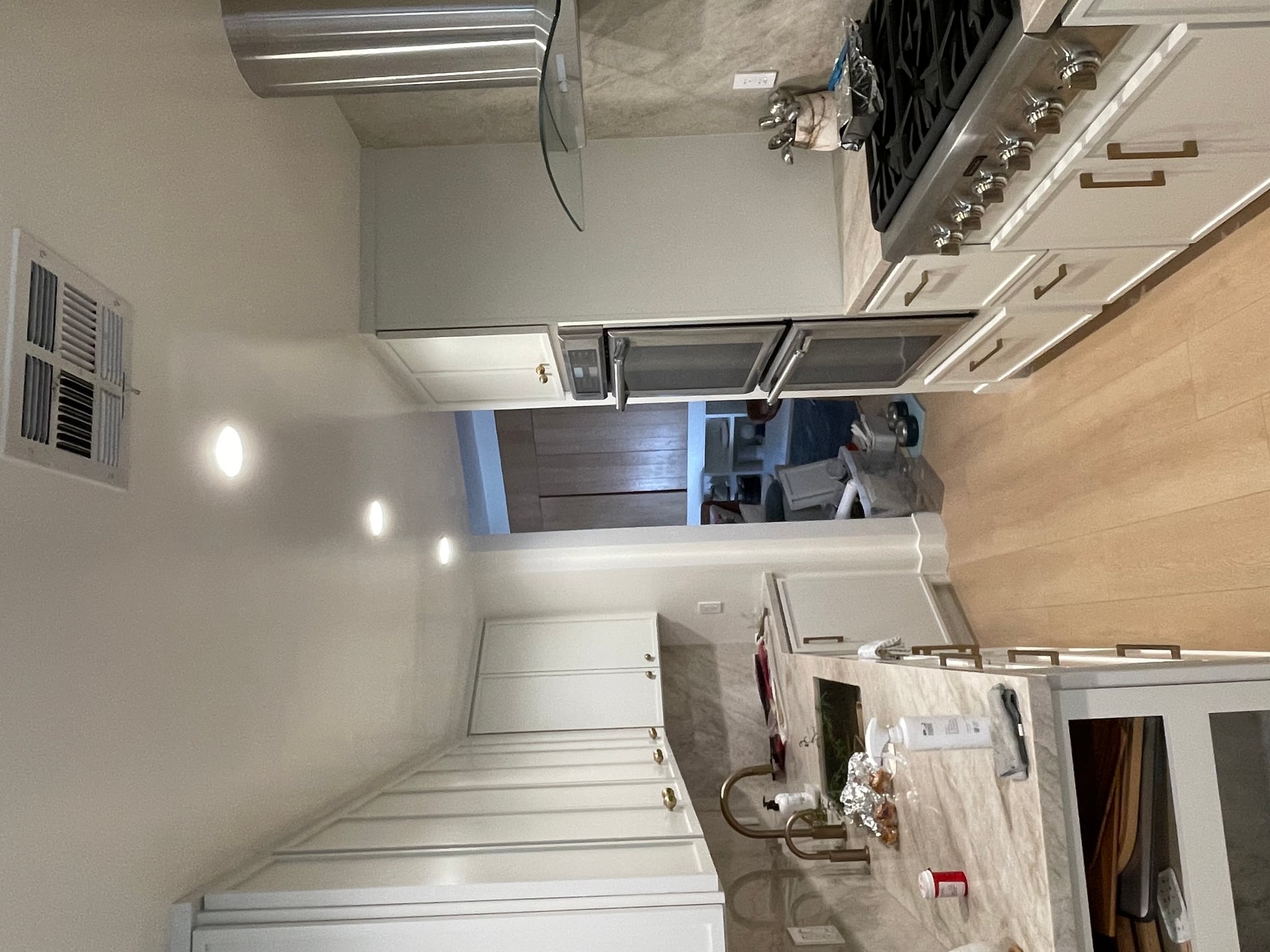 New kitchen Custom Kitchen installed client is super happy in the process of installing the flooring and the new staircase, preparing for entire townhome, faint and patio remodeling