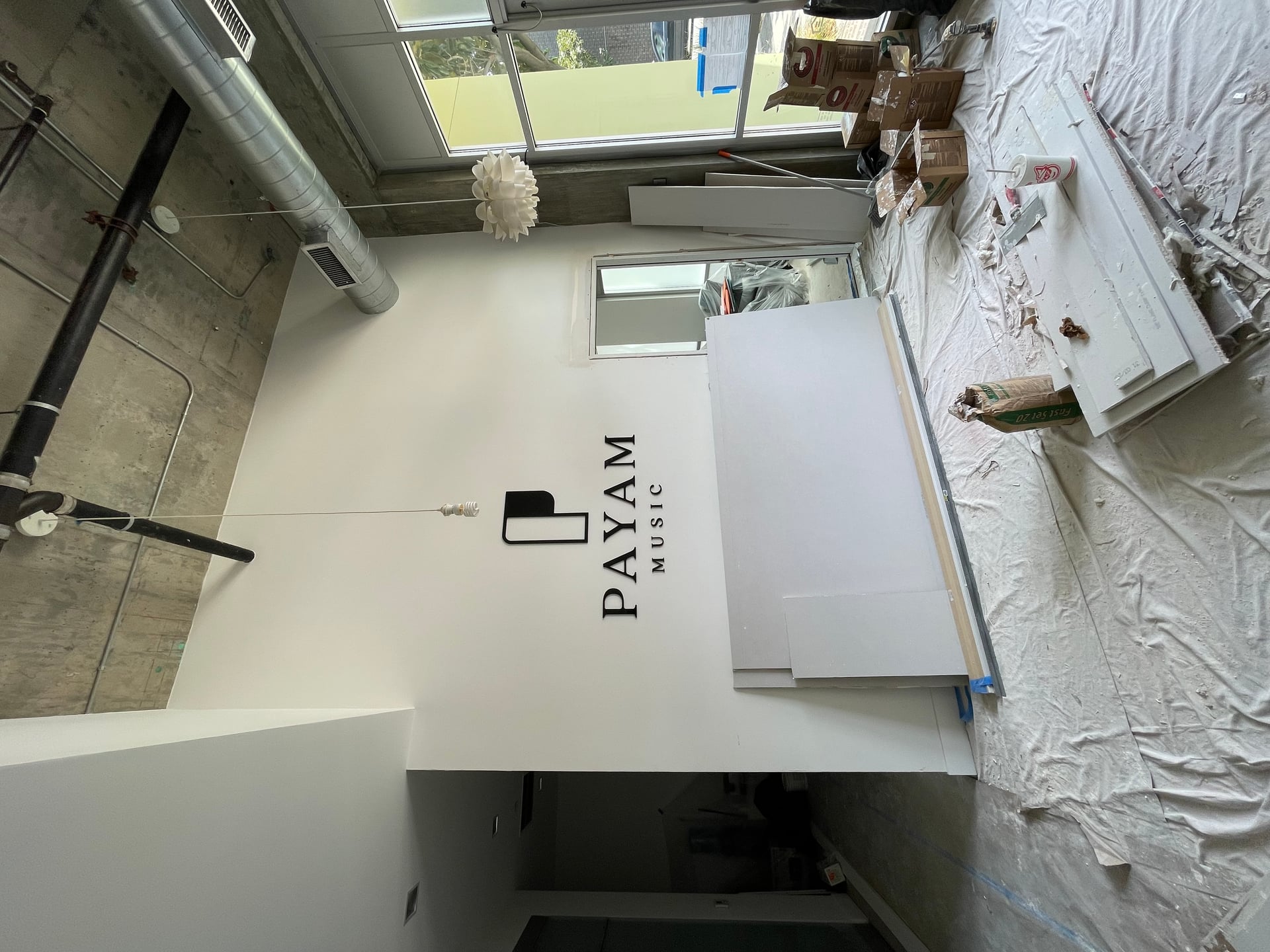 From architectural plan and engineering going through the permitting process to demo framing electrical insulation basically special insulation for the Music school, then Drywall fresh quote of Paint installing new doors and final touches