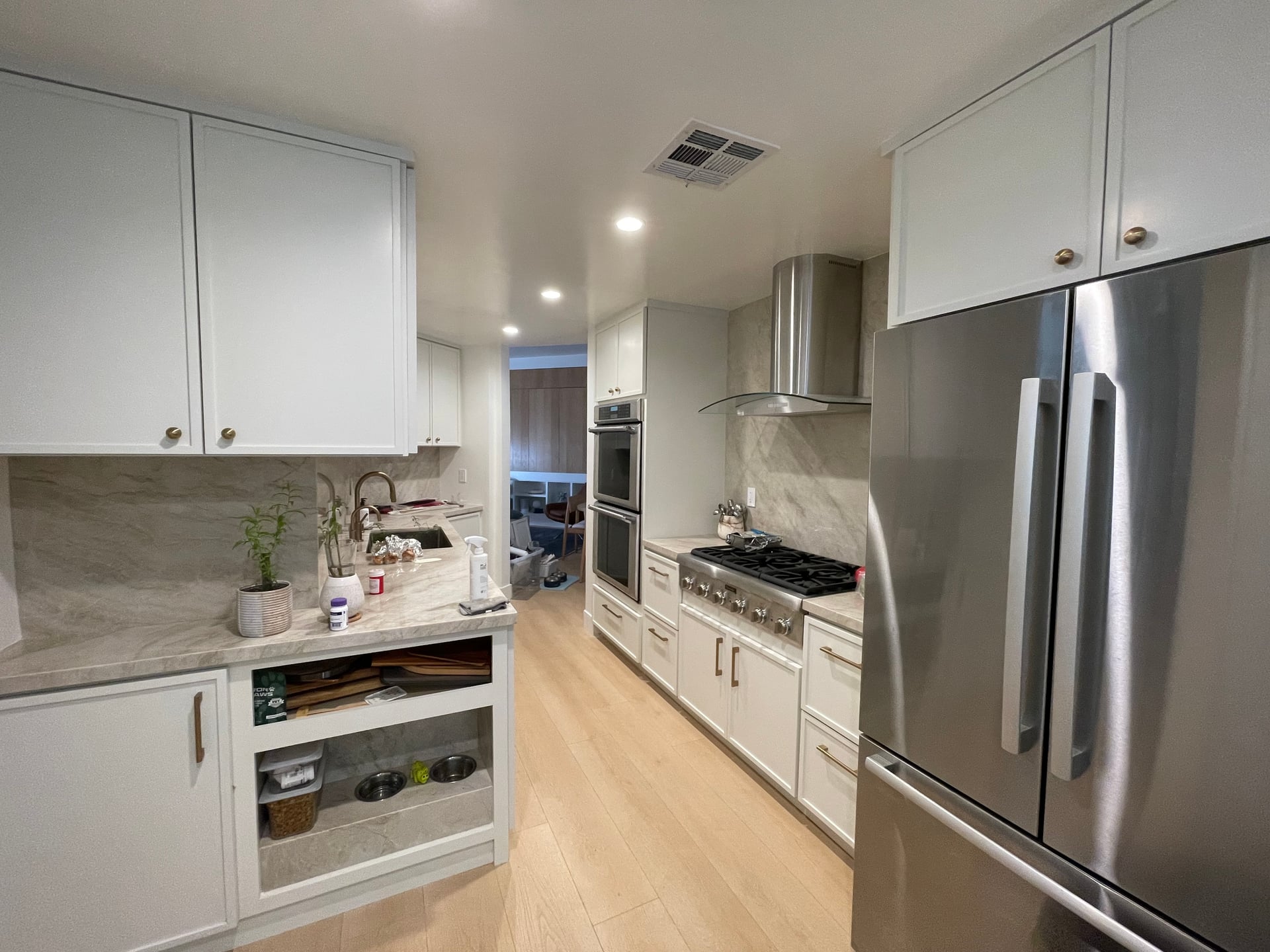 Renovation was complete to the full satisfaction of the Client Custom Kitchen amazing new flooring stairs came out amazingly and painted the entire apartment project complete