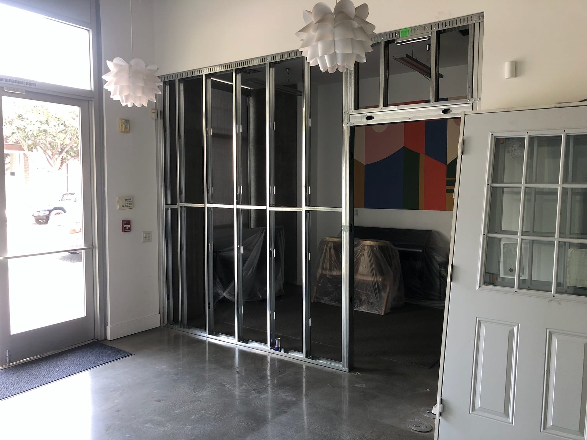 From architectural plan and engineering going through the permitting process to demo framing electrical insulation basically special insulation for the Music school, then Drywall fresh quote of Paint installing new doors and final touches